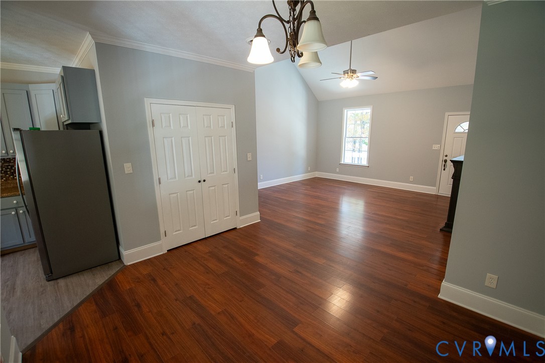 7491 Richmond Road Amelia Court House, VA 23002 - Photo 10 of 39 a view of livingroom with hardwood floor and kitchen view