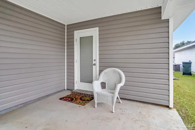 a view of sitting area in front of house