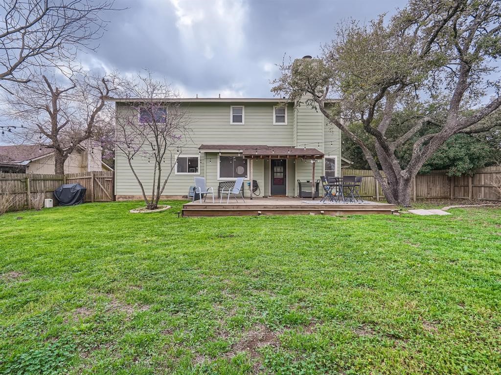 7701 Copano Drive Austin, TX 78749 - Photo 26 of 27 a view of a house with a yard porch and sitting area