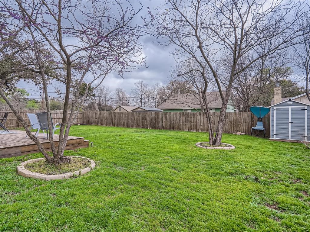 7701 Copano Drive Austin, TX 78749 - Photo 27 of 27 a swimming pool with lots of tress in front of it