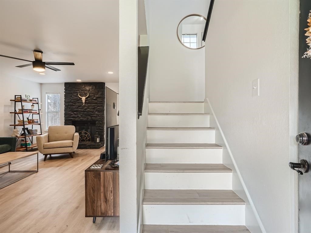 7701 Copano Drive Austin, TX 78749 - Photo 5 of 27 a view of a livingroom with furniture and staircase