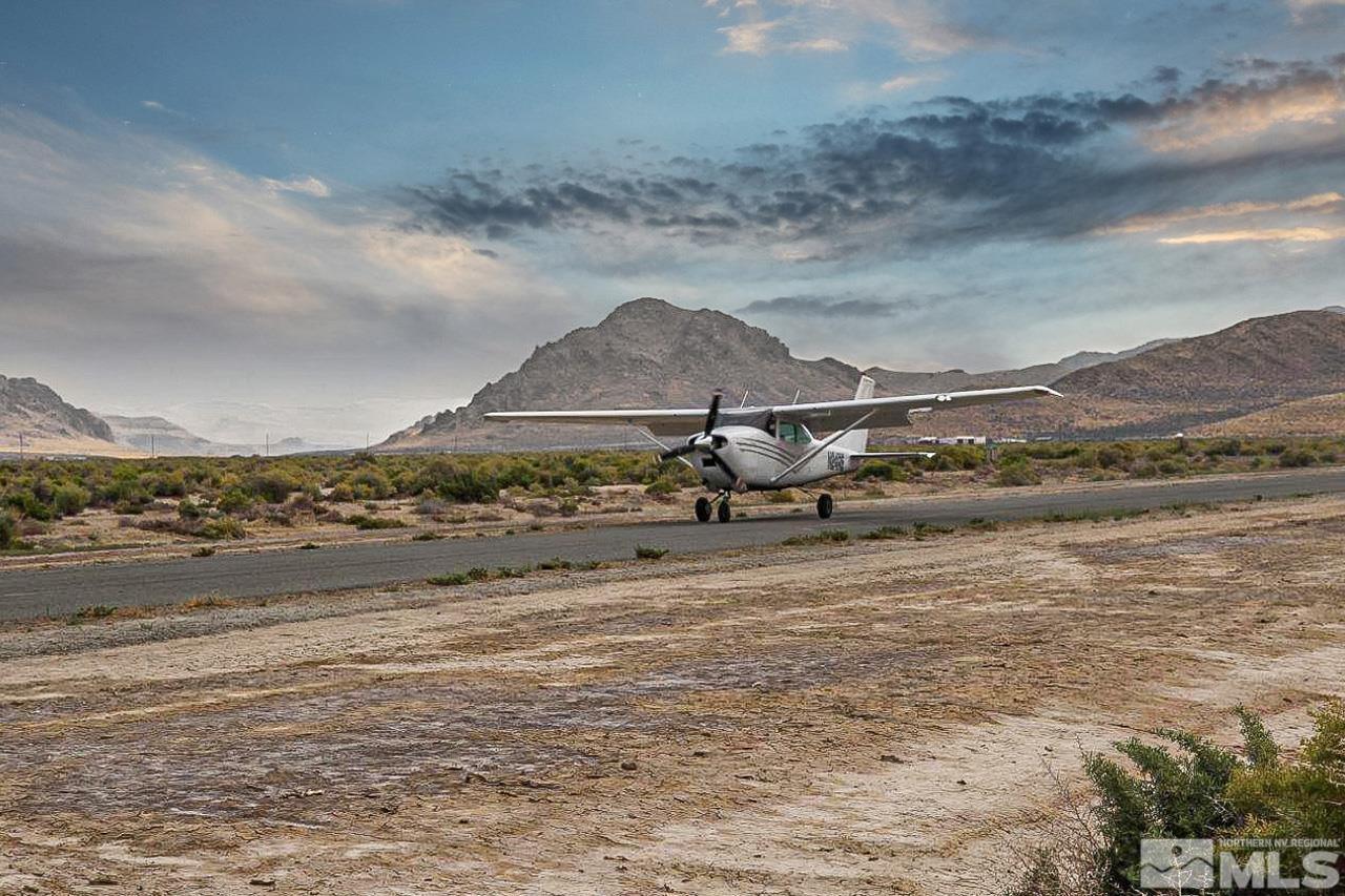 5305 Flying Eagle Drive Reno, NV 89510 - Photo 5 of 23 a view of a lake with mountain in the background