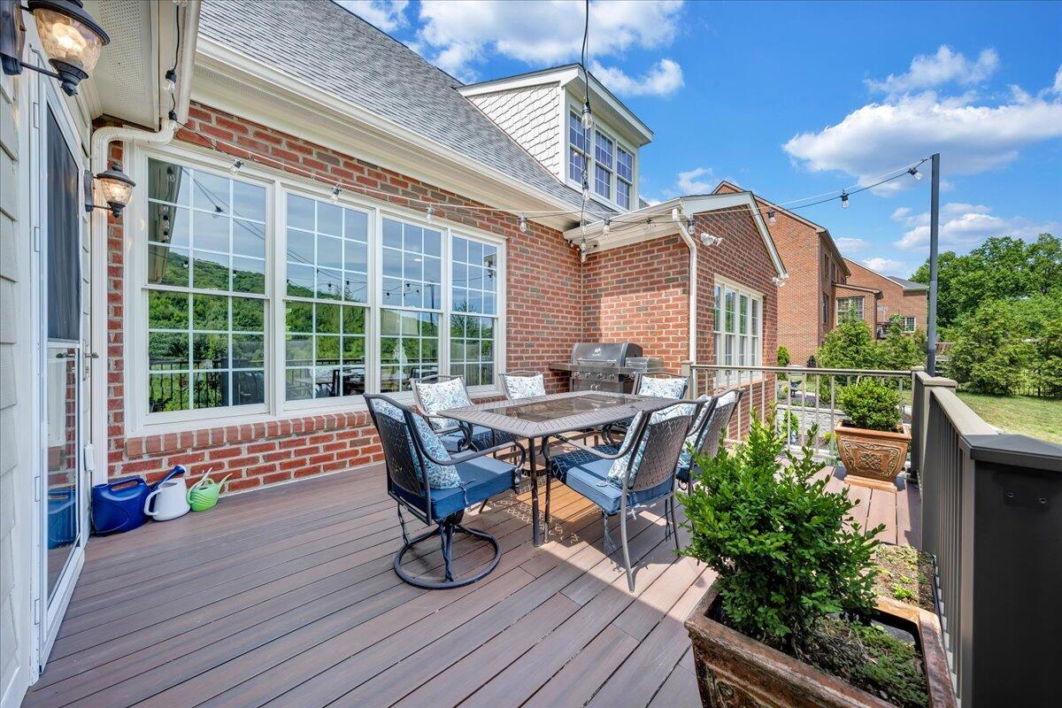 6865 Fairway Ridge Road Salem, VA 24153 - Photo 25 of 86 a roof deck with table and chairs and potted plants