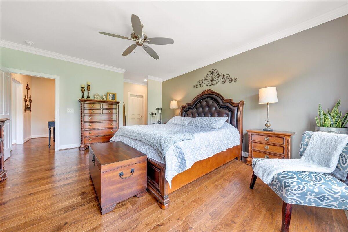 6865 Fairway Ridge Road Salem, VA 24153 - Photo 29 of 86 a bedroom with furniture and wooden floor