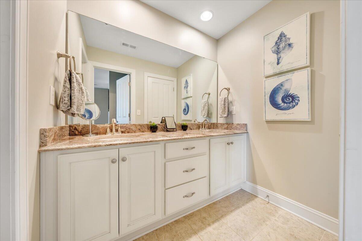 6865 Fairway Ridge Road Salem, VA 24153 - Photo 46 of 86 a bathroom with a sink and a mirror