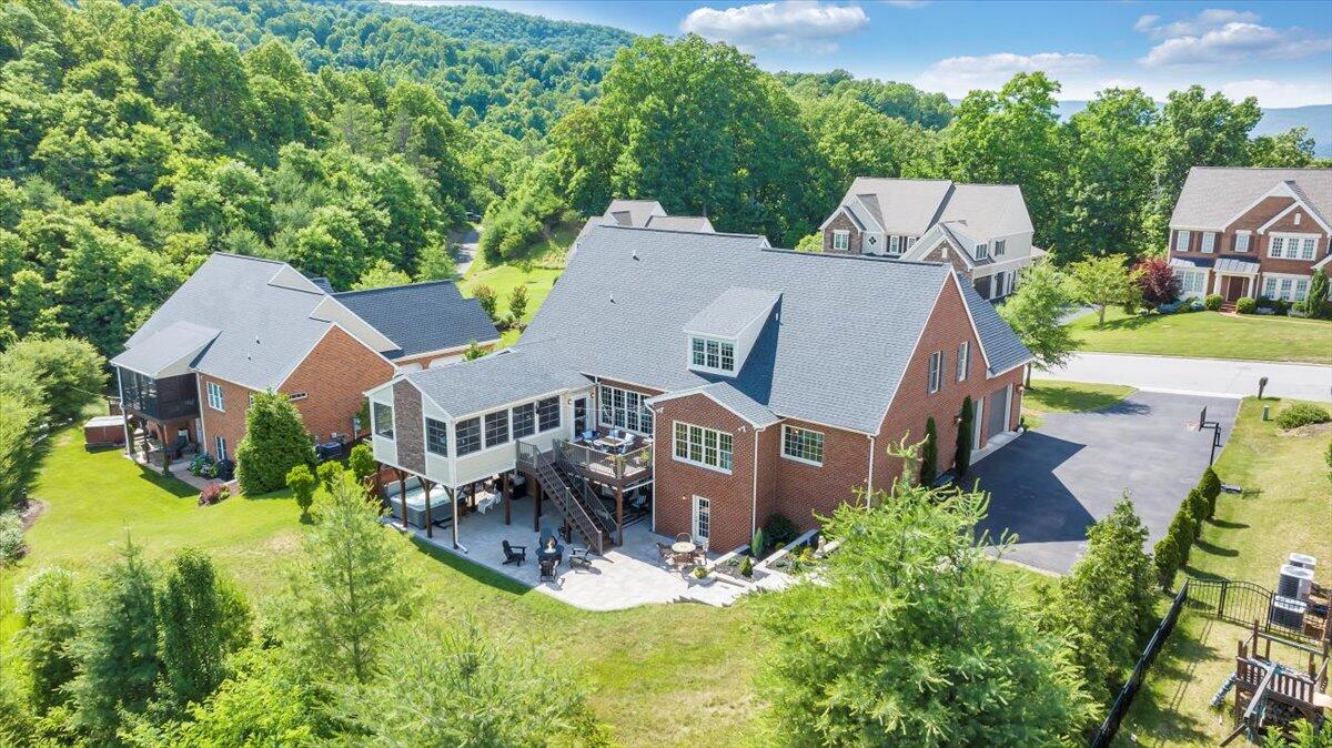 6865 Fairway Ridge Road Salem, VA 24153 - Photo 71 of 86 an aerial view of a house with swimming pool and garden
