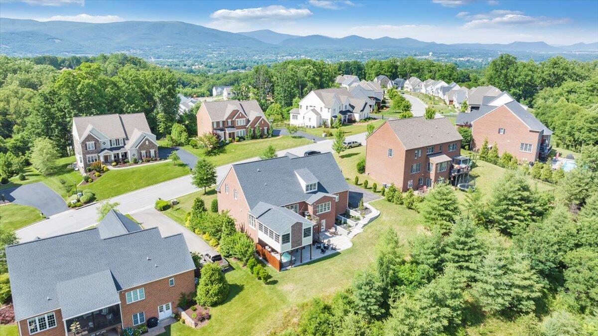 6865 Fairway Ridge Road Salem, VA 24153 - Photo 73 of 86 an aerial view of a house with garden space and a mountain view in back