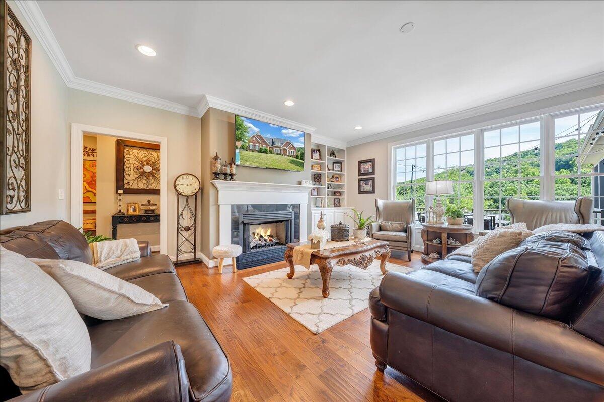 6865 Fairway Ridge Road Salem, VA 24153 - Photo 10 of 86 a living room with furniture fireplace and a large window