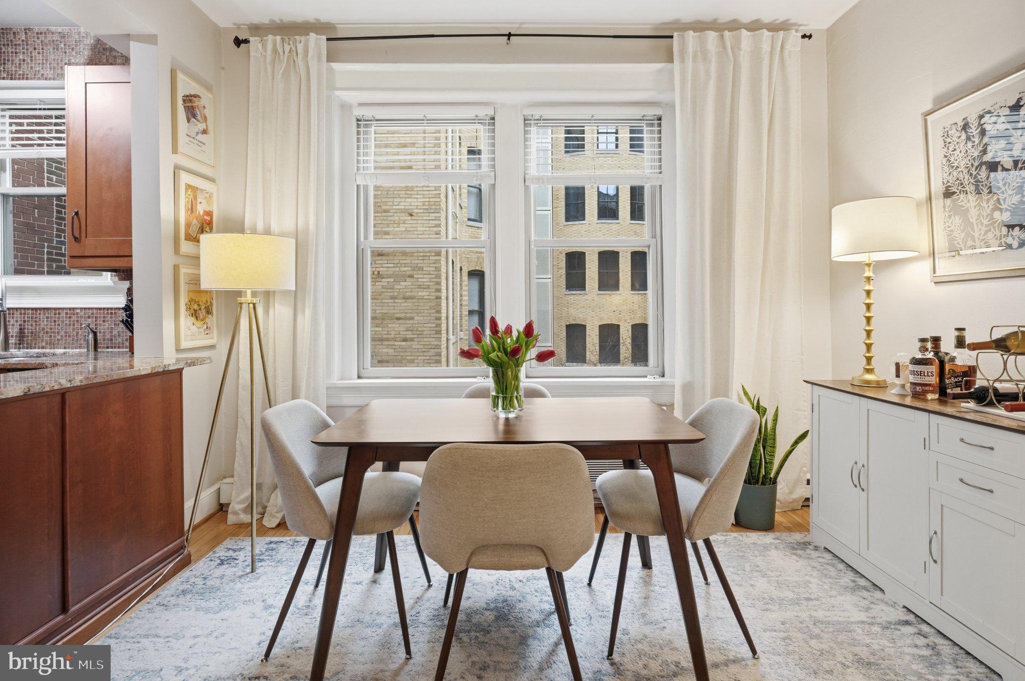 2010 Kalorama Road Northwest, Unit 304 Washington, DC 20009 - Photo 8 of 23 Bright dining space with urban views.