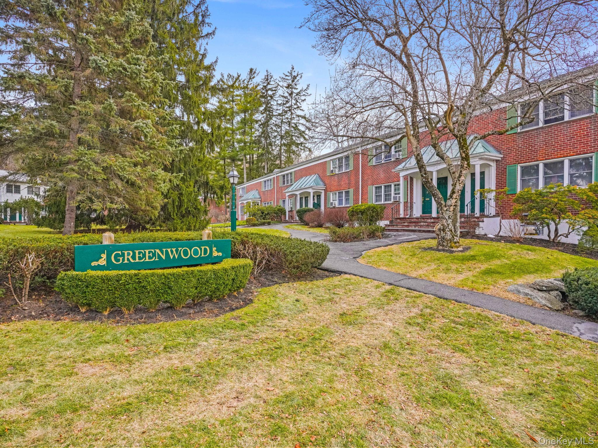 600 Bedford Road, Unit 15 Pleasantville, NY 10570 - Photo 1 of 1 a front view of a house with a yard