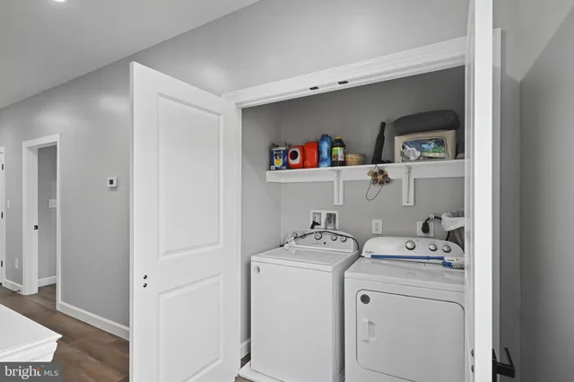 a storage room with washer and dryer