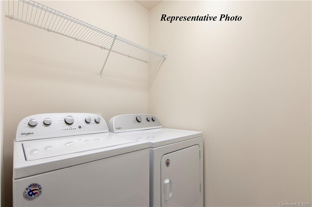 475 Hunters Dance Road, Unit 337 Fort Mill, SC 29708 - Photo 13 of 22 a utility room with dryer and washer