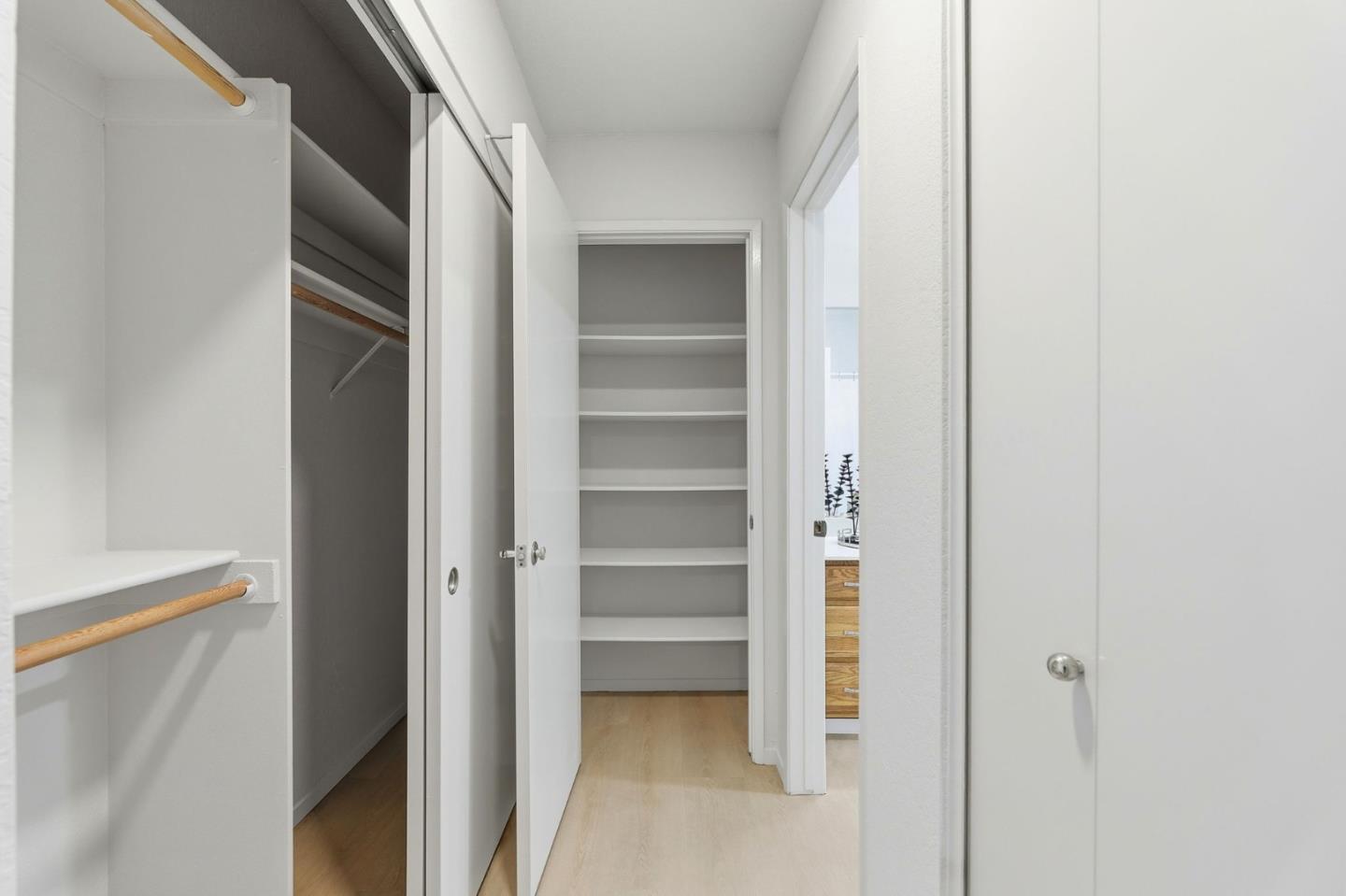 22330 Homestead Road, Unit 226 Cupertino, CA 95014 - Photo 24 of 38 a view of walk in closet with empty racks