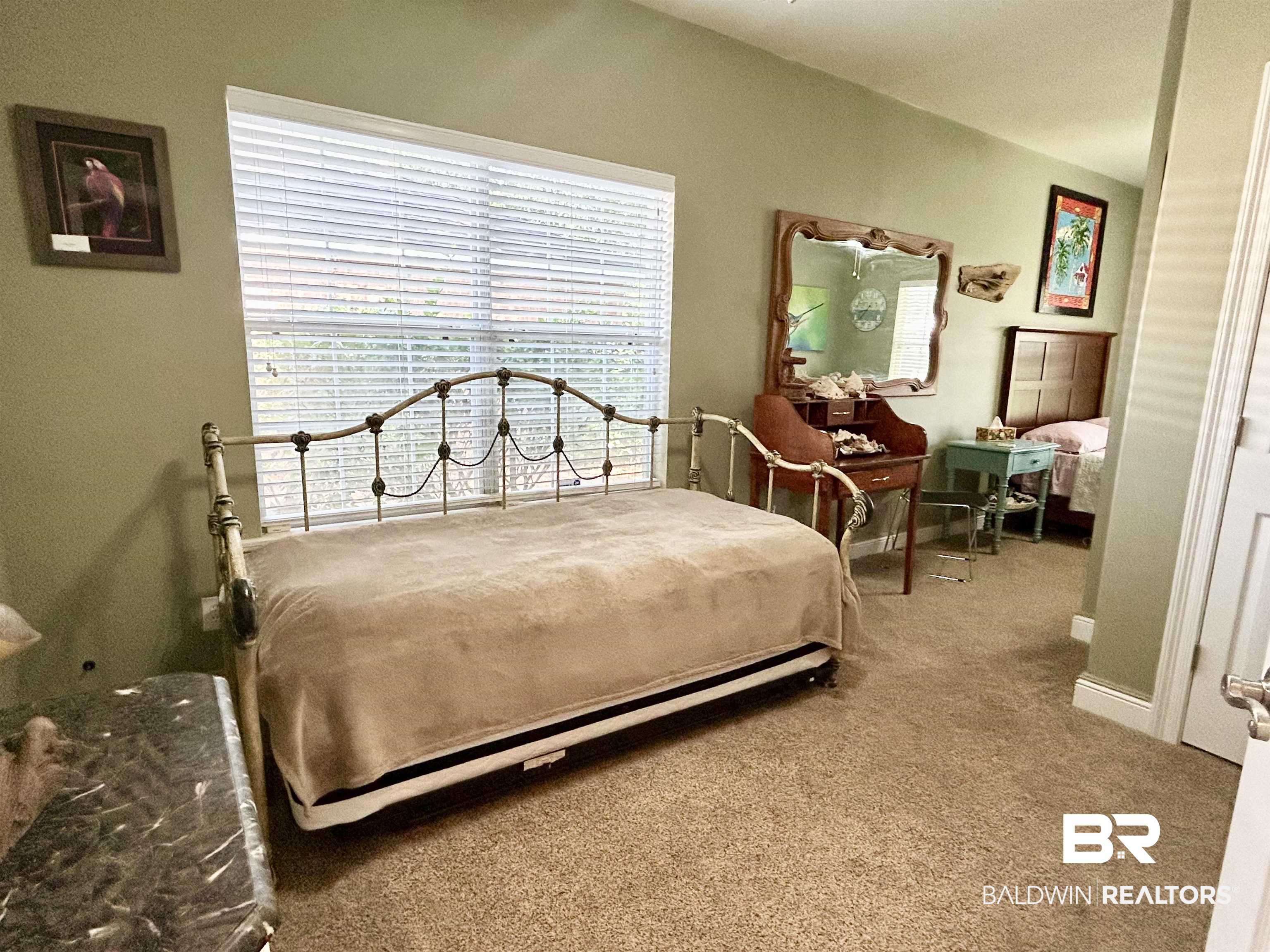 177 Mark Twain Loop Foley, AL 36535 - Photo 23 of 47 Second Bedroom that is very spacious. This was a 3BR house - but wall separating BR 2 and BR 3 was removed making it one large room.