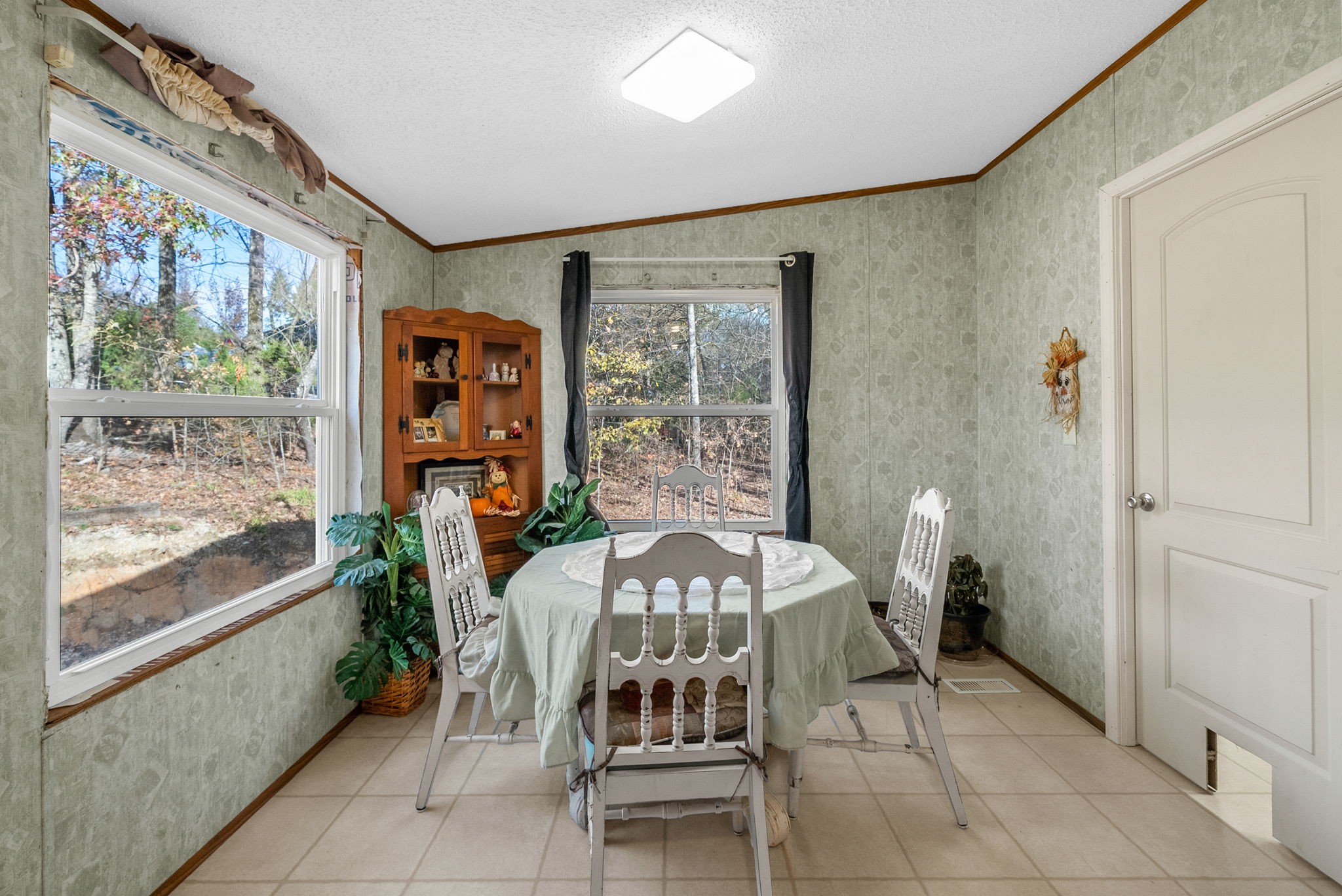 197 Old Homestead Road Big Sandy, TN 38221 - Photo 17 of 59 a view of a dining room with furniture window and outside view