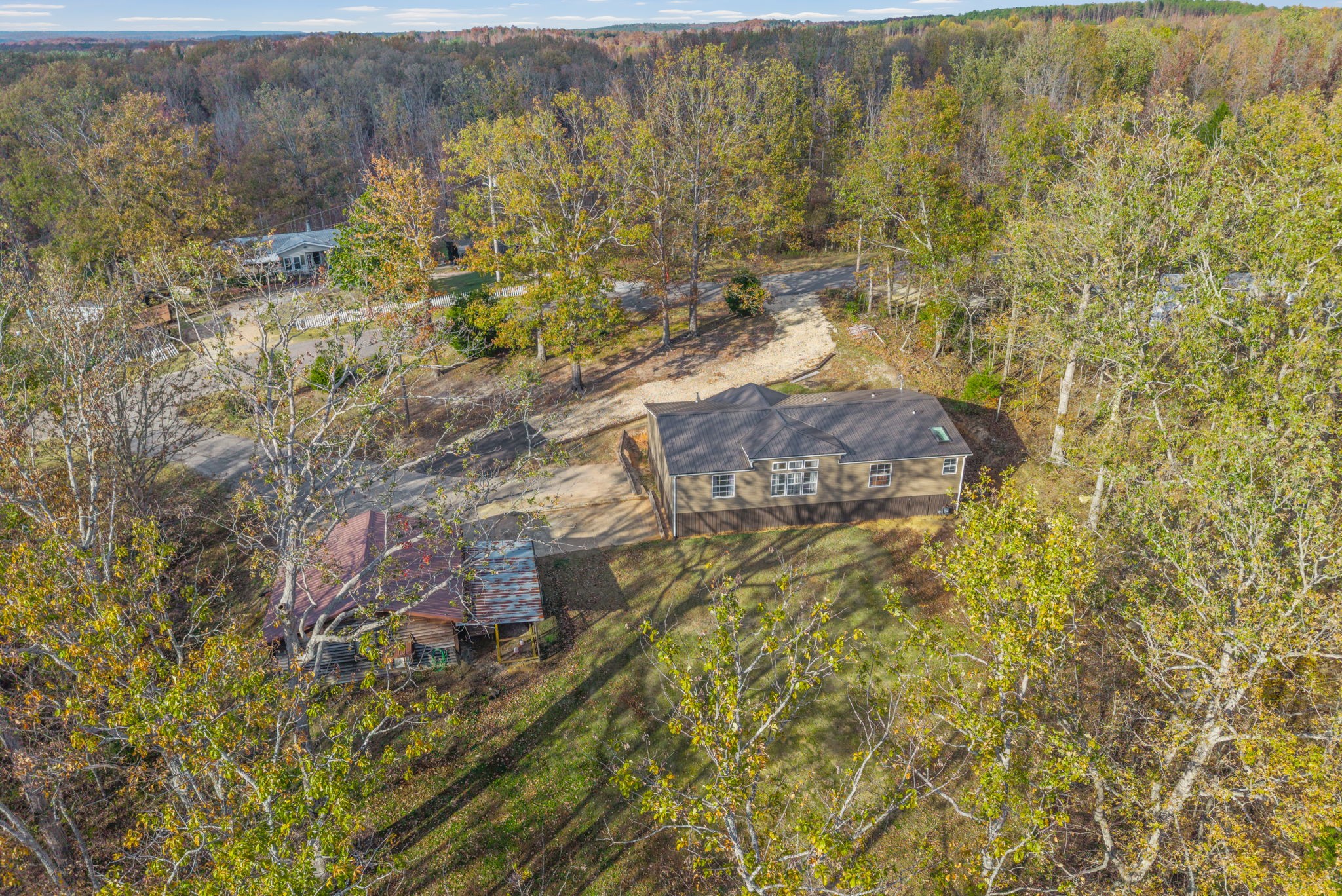 197 Old Homestead Road Big Sandy, TN 38221 - Photo 43 of 59 a bathroom with a building