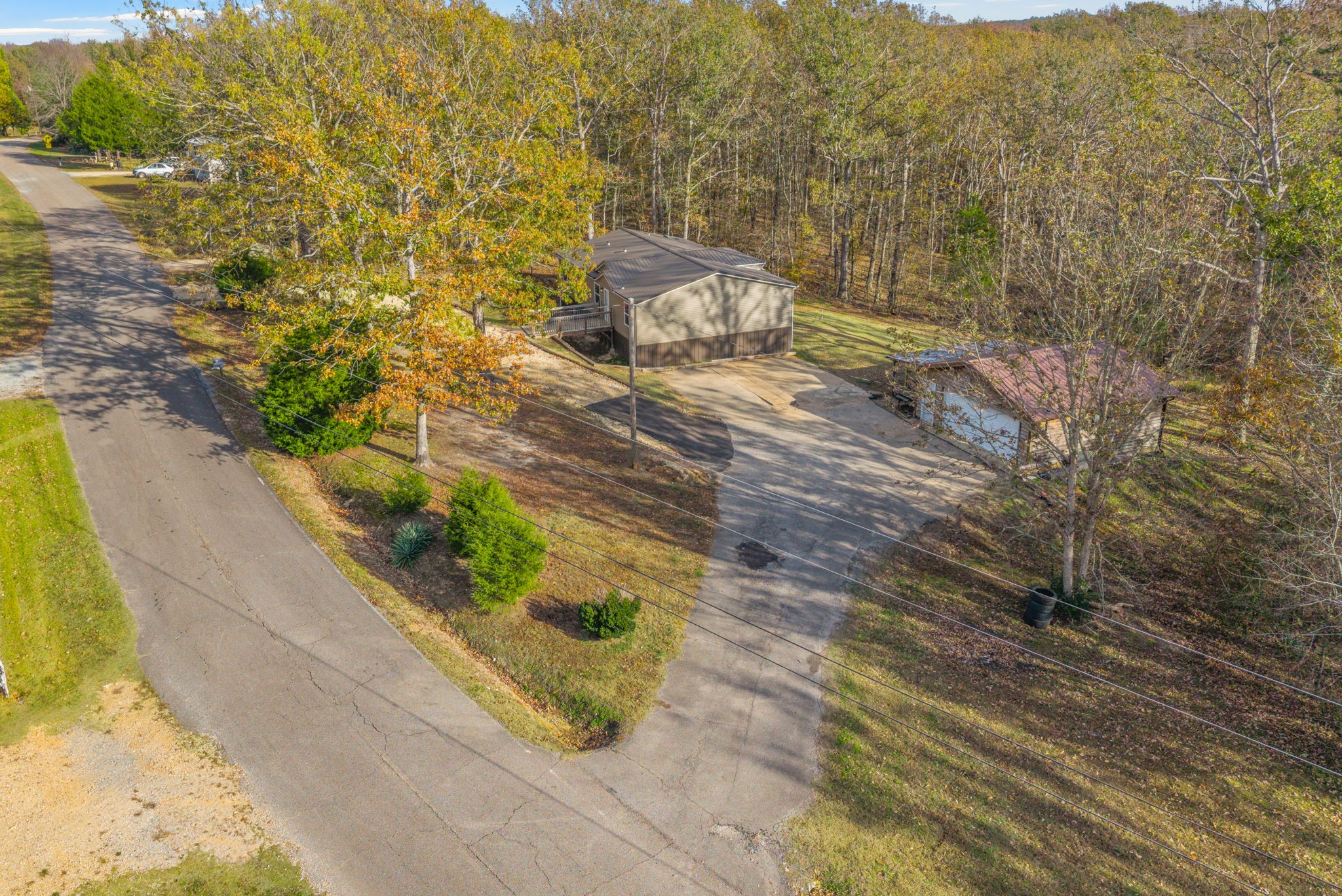 197 Old Homestead Road Big Sandy, TN 38221 - Photo 7 of 59 a view of a yard with an outdoor space