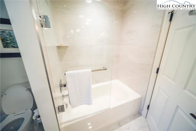 a bathroom with sink and a bathtub