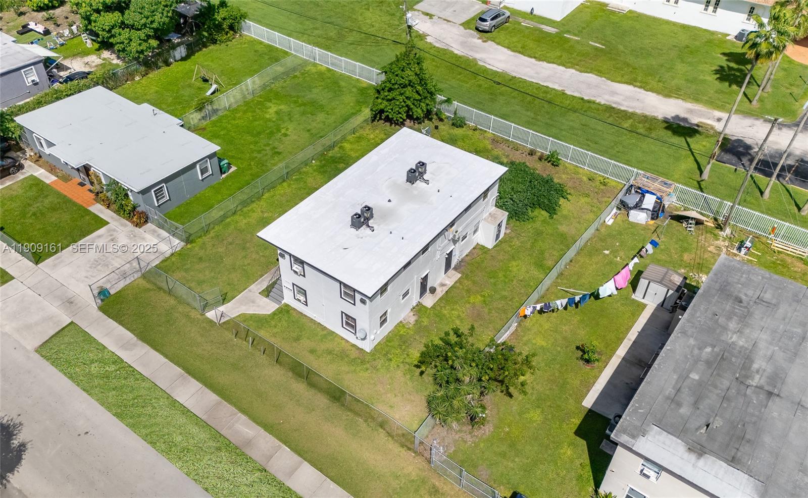 10015 Southwest 170th Terrace Miami, FL 33157 - Photo 11 of 14 an aerial view of a house