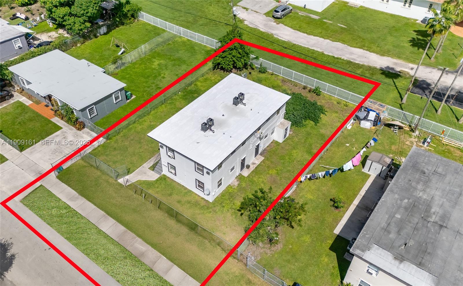 10015 Southwest 170th Terrace Miami, FL 33157 - Photo 10 of 14 an aerial view of a tennis court