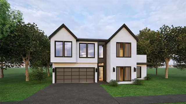 a front view of a house with a yard and trees