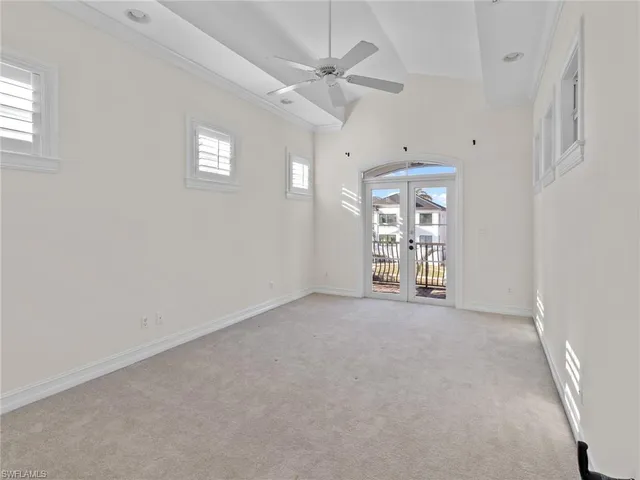 a spacious bathroom with a granite countertop sink a mirror and shower