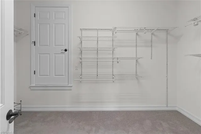 a view of a hallway with entryway