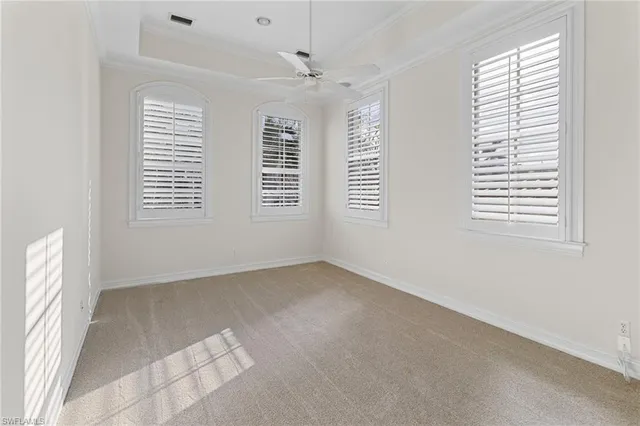 a bathroom with a granite countertop sink toilet a mirror and shower