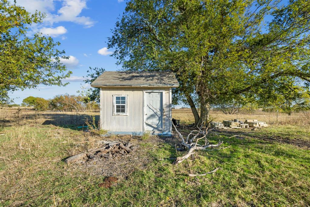 Tbd Krause Road Holland, TX 76534 - Photo 13 of 26 a backyard of a house with table and chairs