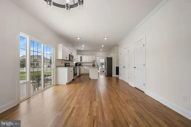 a view of kitchen with wooden floor
