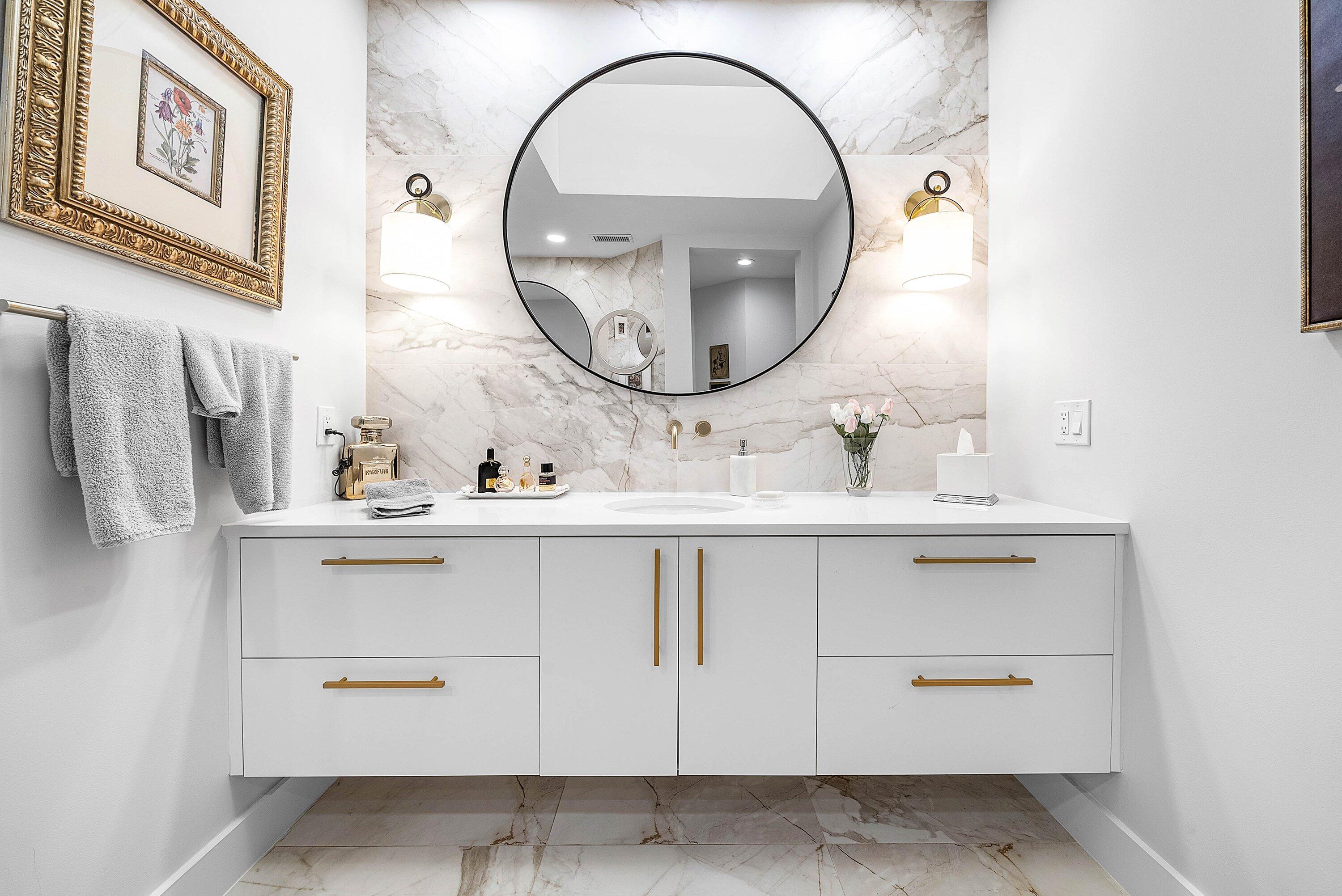 2224 Northwest 62nd Drive Boca Raton, FL 33496 - Photo 23 of 64 a bathroom with a sink and a mirror