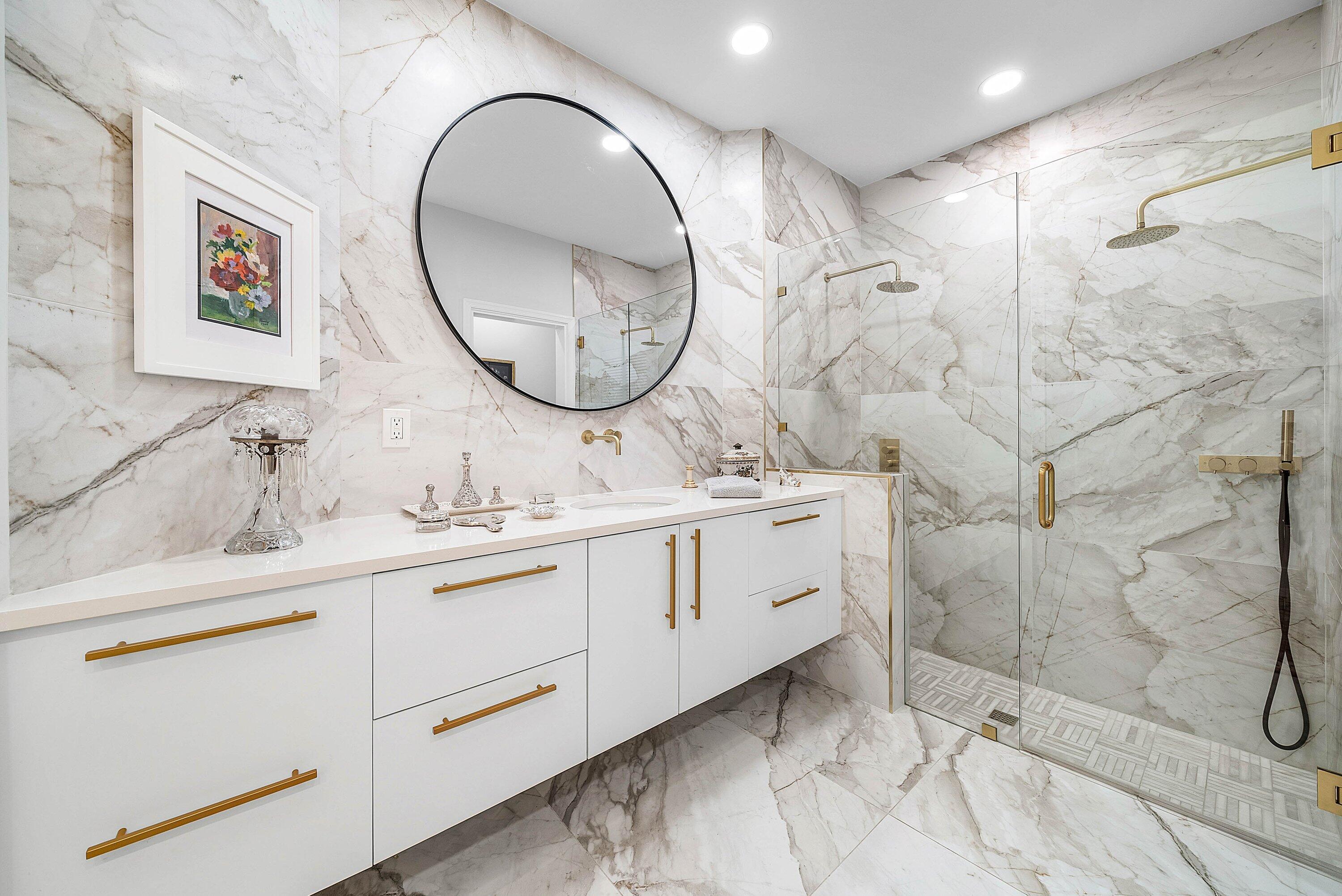 2224 Northwest 62nd Drive Boca Raton, FL 33496 - Photo 24 of 64 a bathroom with a double vanity sink mirror and