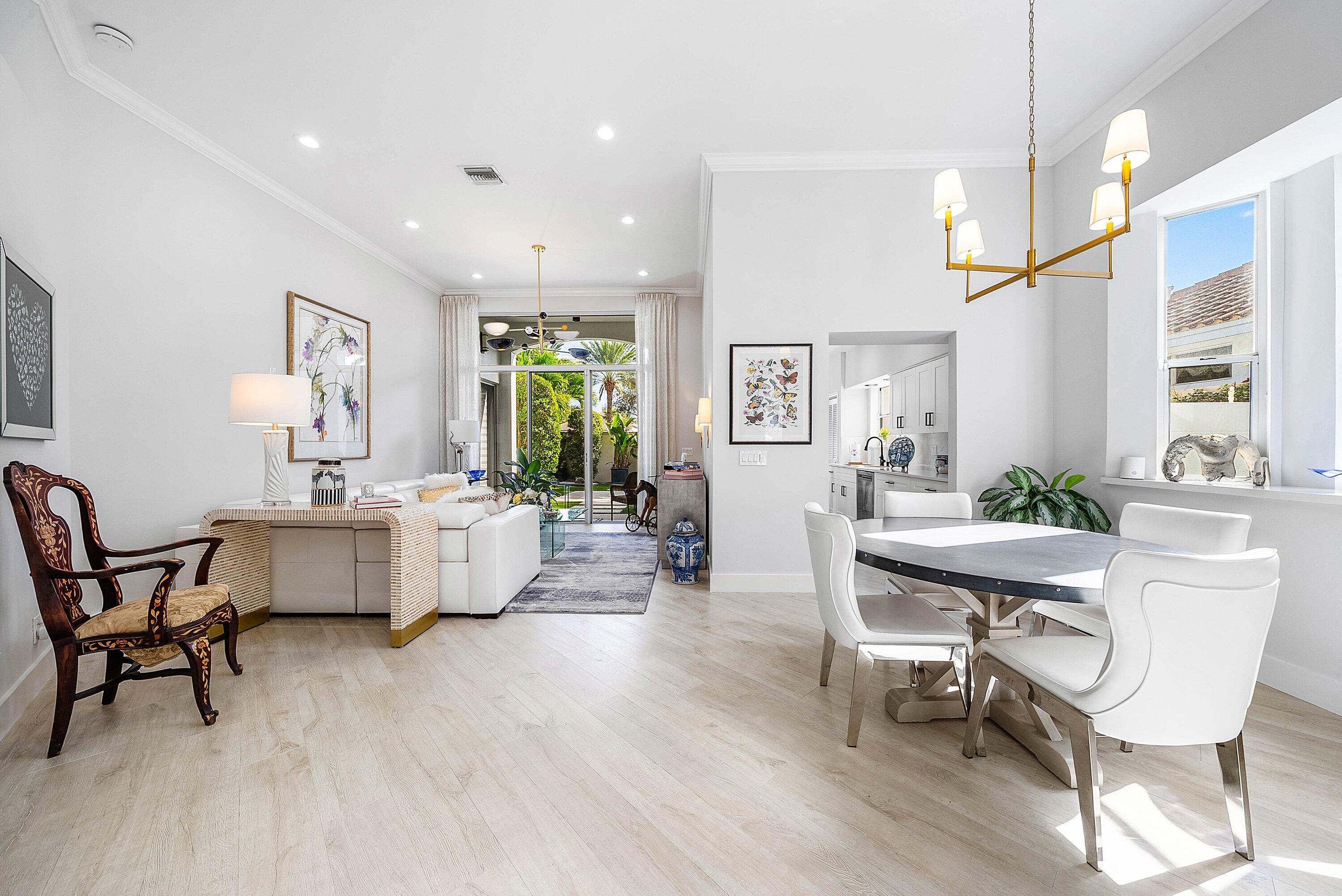 2224 Northwest 62nd Drive Boca Raton, FL 33496 - Photo 5 of 64 a living room with fireplace furniture and a wooden floor