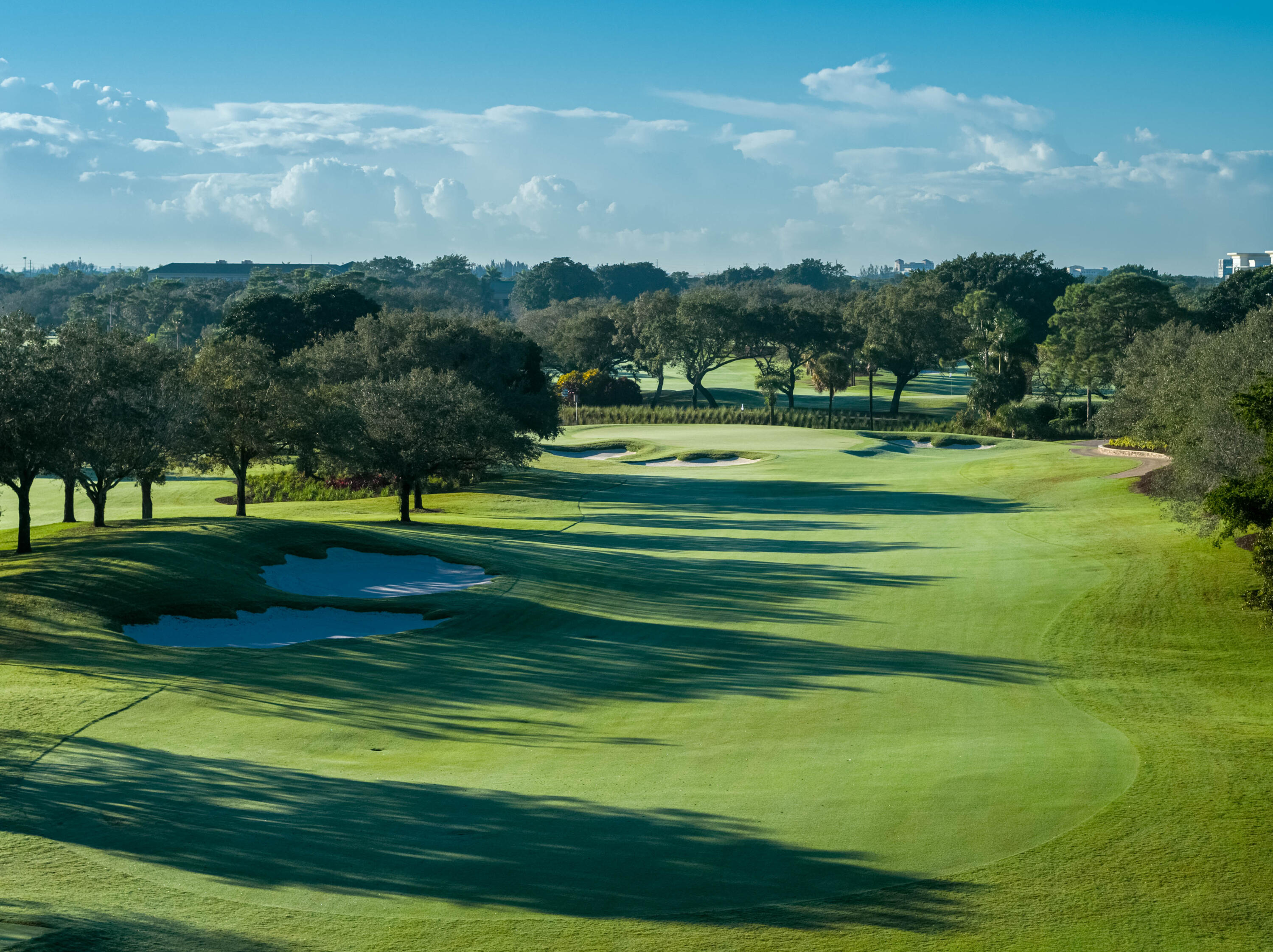 2224 Northwest 62nd Drive Boca Raton, FL 33496 - Photo 58 of 64 a view of a golf course with a lake