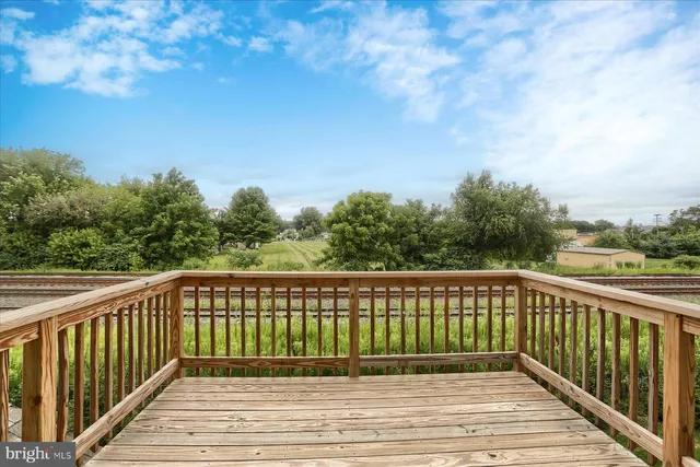 a view of a wooden fence