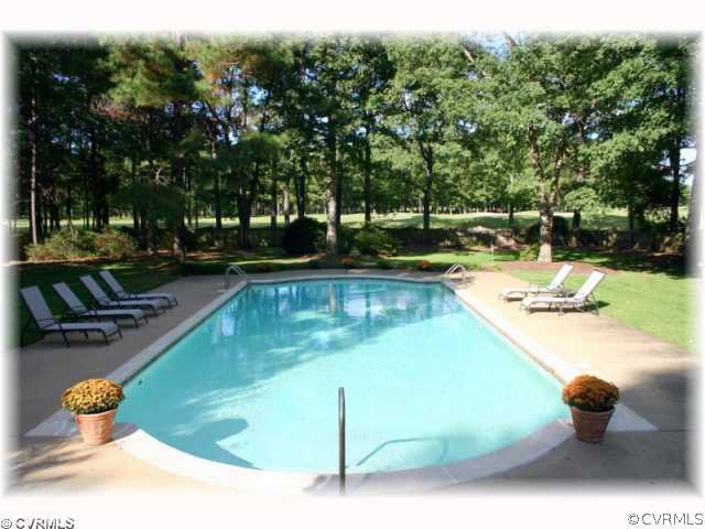 2539 Kentford Road Midlothian, VA 23113 - Photo 8 of 12 a view of a swimming pool and lounge chair