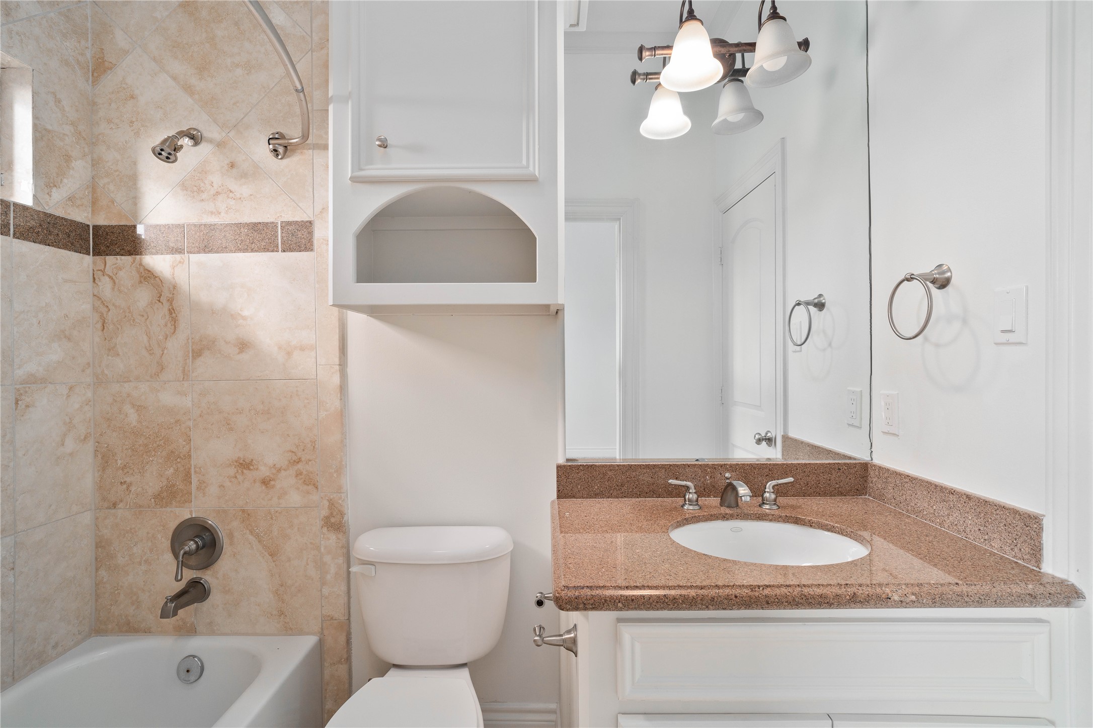 704 Welch Street Houston, TX 77006 - Photo 19 of 23 a bathroom with a sink a toilet and shower