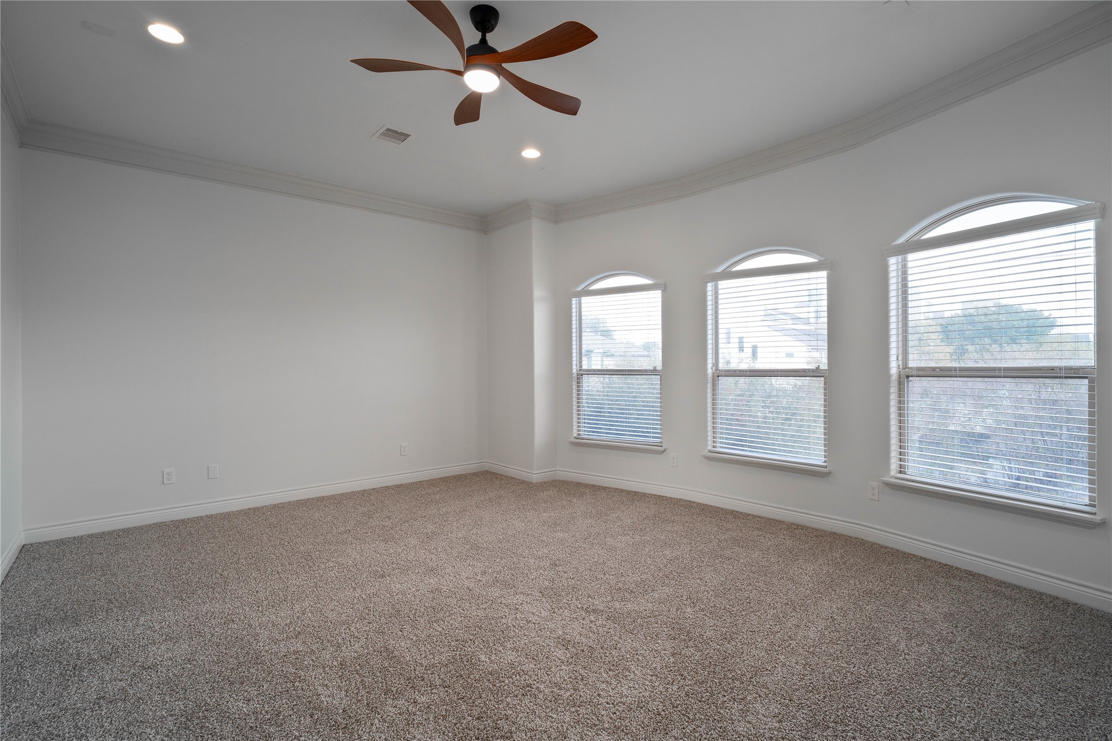 704 Welch Street Houston, TX 77006 - Photo 20 of 23 a view of an empty room with a window