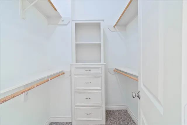 a view of a walk in closet