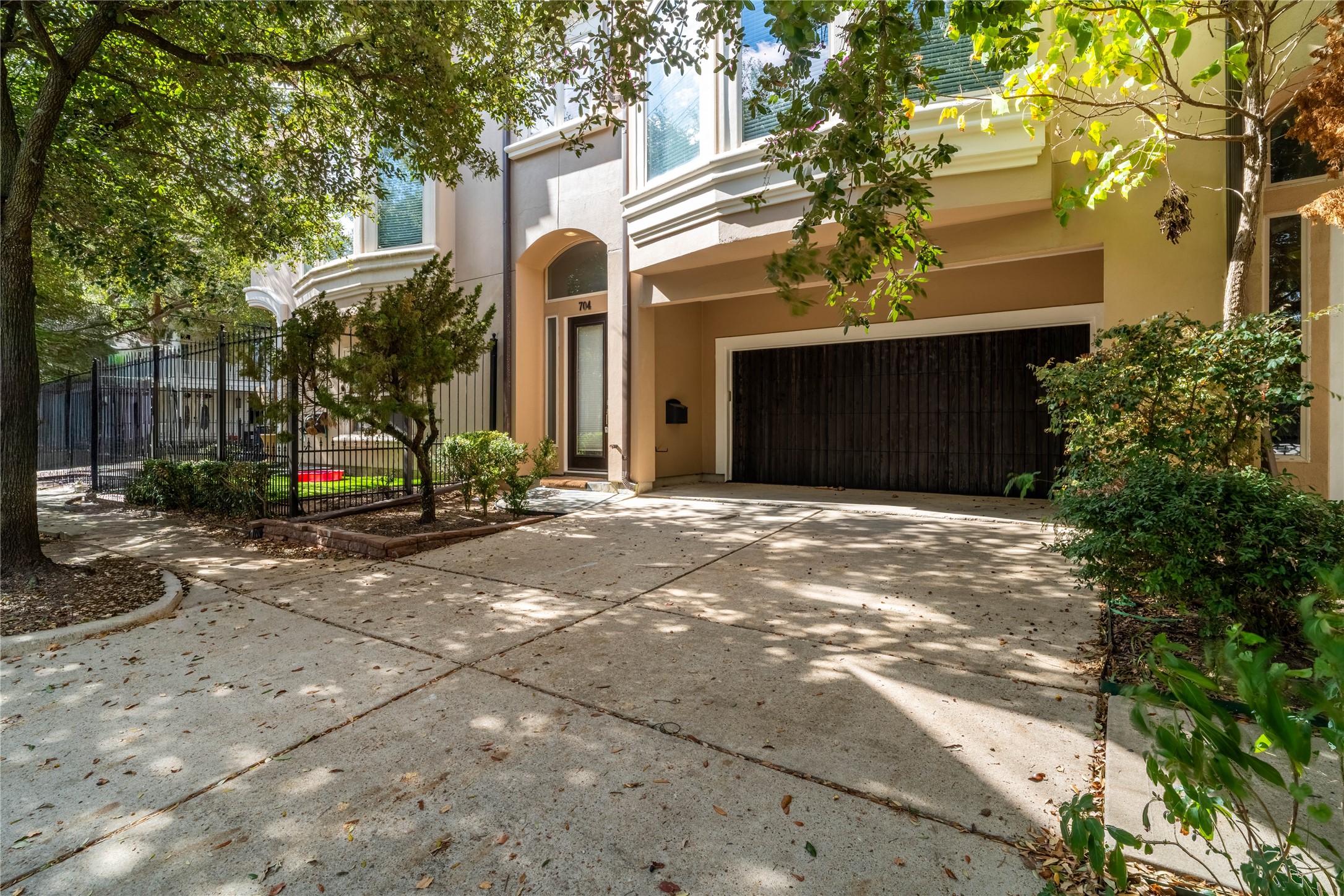 704 Welch Street Houston, TX 77006 - Photo 23 of 23 a view of a house with a yard