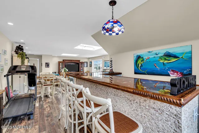 a very nice looking dining room with a table and chairs