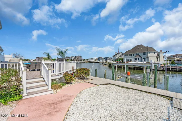 a view of a lake with a house