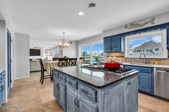 a kitchen with granite countertop lots of counter top space