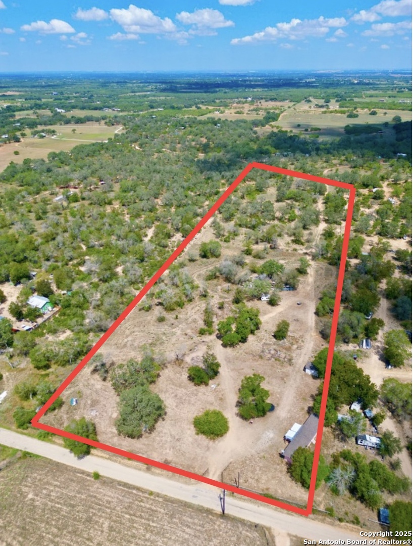 650 Patton Road Somerset, TX 78069 - Photo 2 of 5 a view of an outdoor space and a lake view