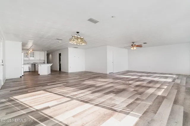 a view of a livingroom with a furniture