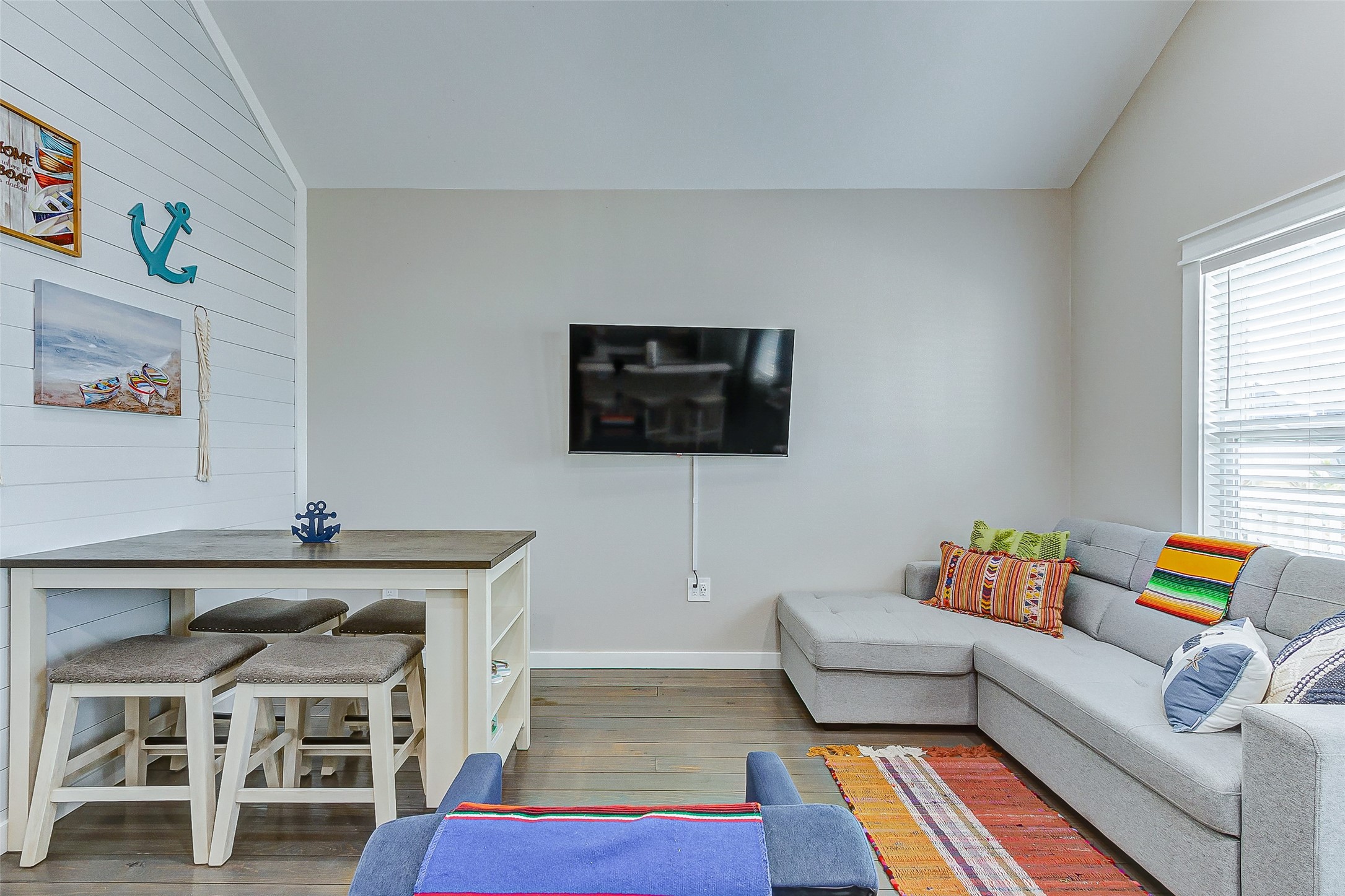 1052 Johnson Road Port Bolivar, TX 77650 - Photo 16 of 40 a living room with furniture and a flat screen tv