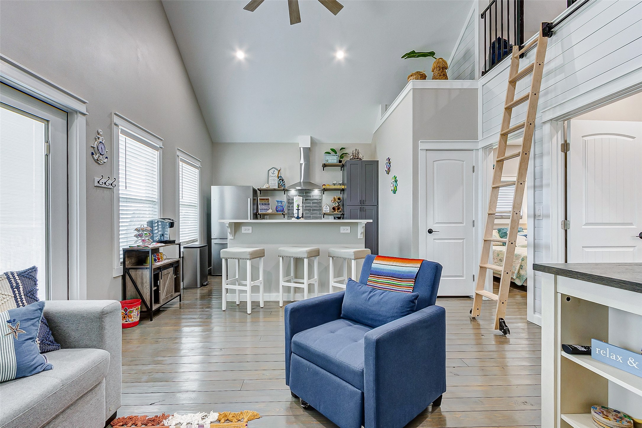 1052 Johnson Road Port Bolivar, TX 77650 - Photo 17 of 40 a living room with furniture and a fireplace