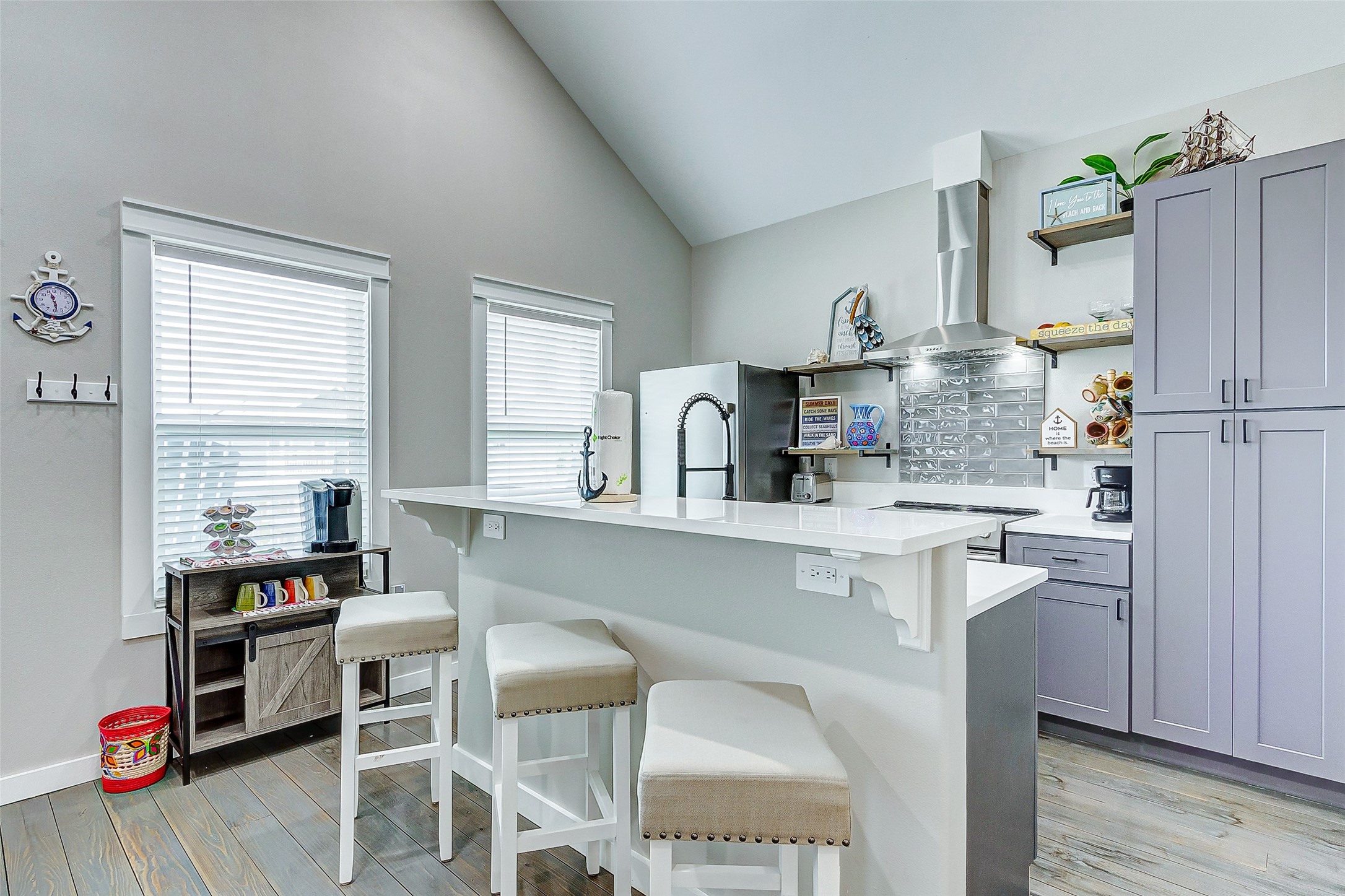 1052 Johnson Road Port Bolivar, TX 77650 - Photo 19 of 40 a kitchen with stainless steel appliances a stove a sink cabinets and a refrigerator