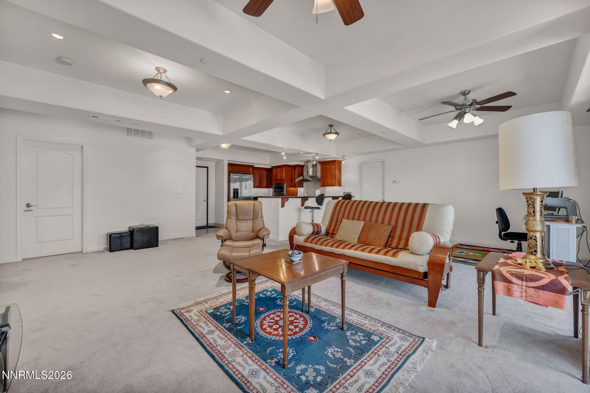 200 West 2nd Street, Unit 1103 Reno, NV 89501 - Photo 14 of 49 a living room with furniture and a rug