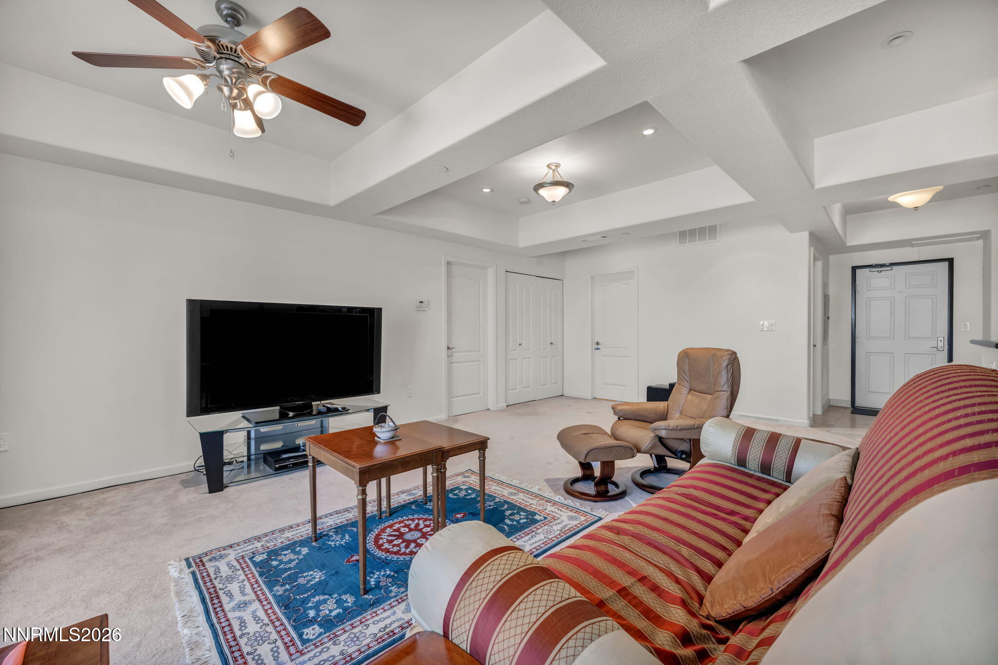 200 West 2nd Street, Unit 1103 Reno, NV 89501 - Photo 15 of 49 a living room with furniture and a flat screen tv